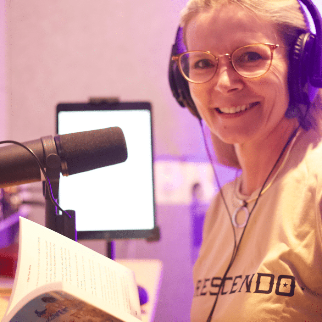 Susie Cato in audio booth at Crescendo Studio
